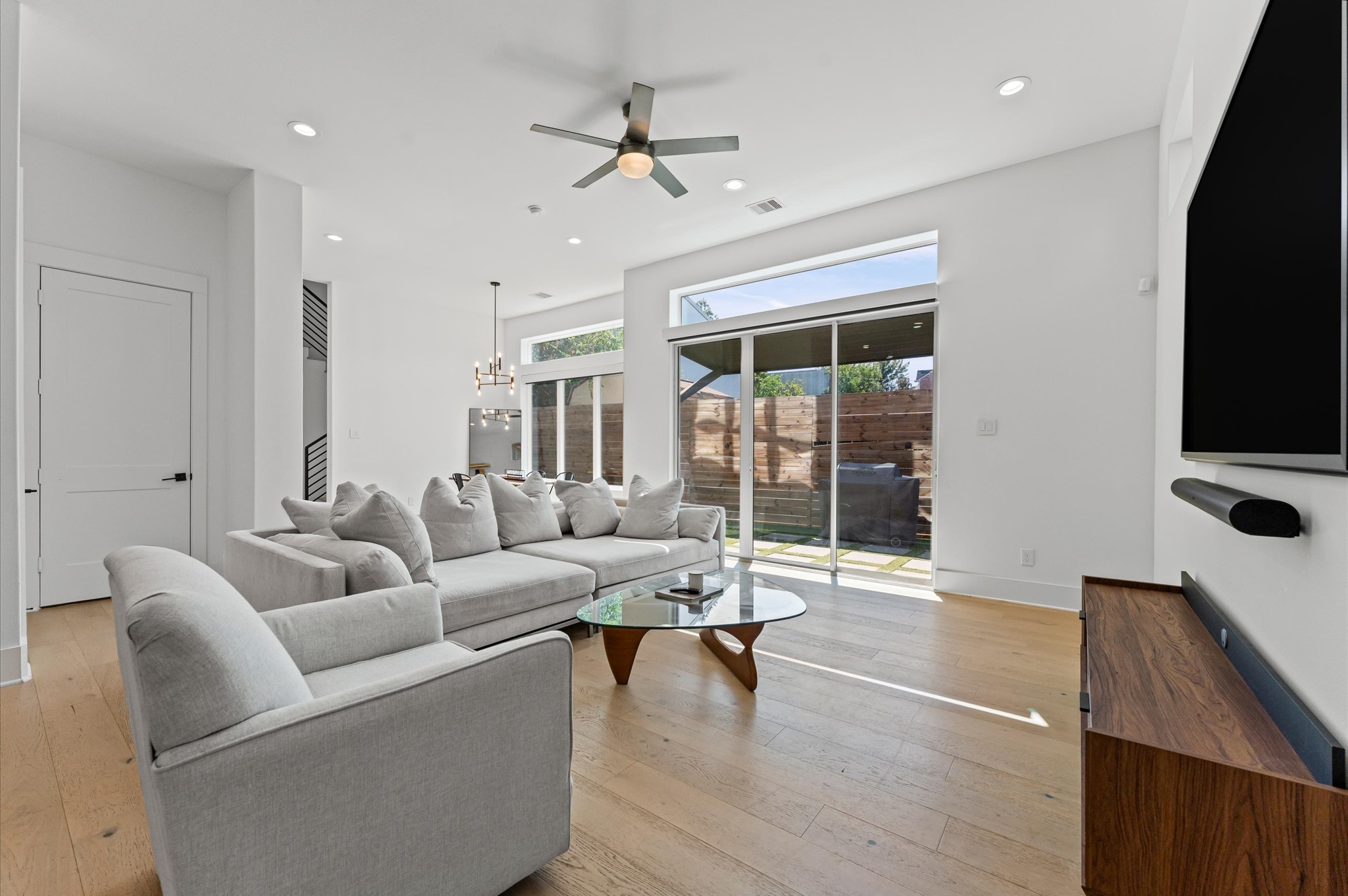 711 Lester Street Houston, TX 77007 - Photo 12 of 39 a living room with furniture and a flat screen tv