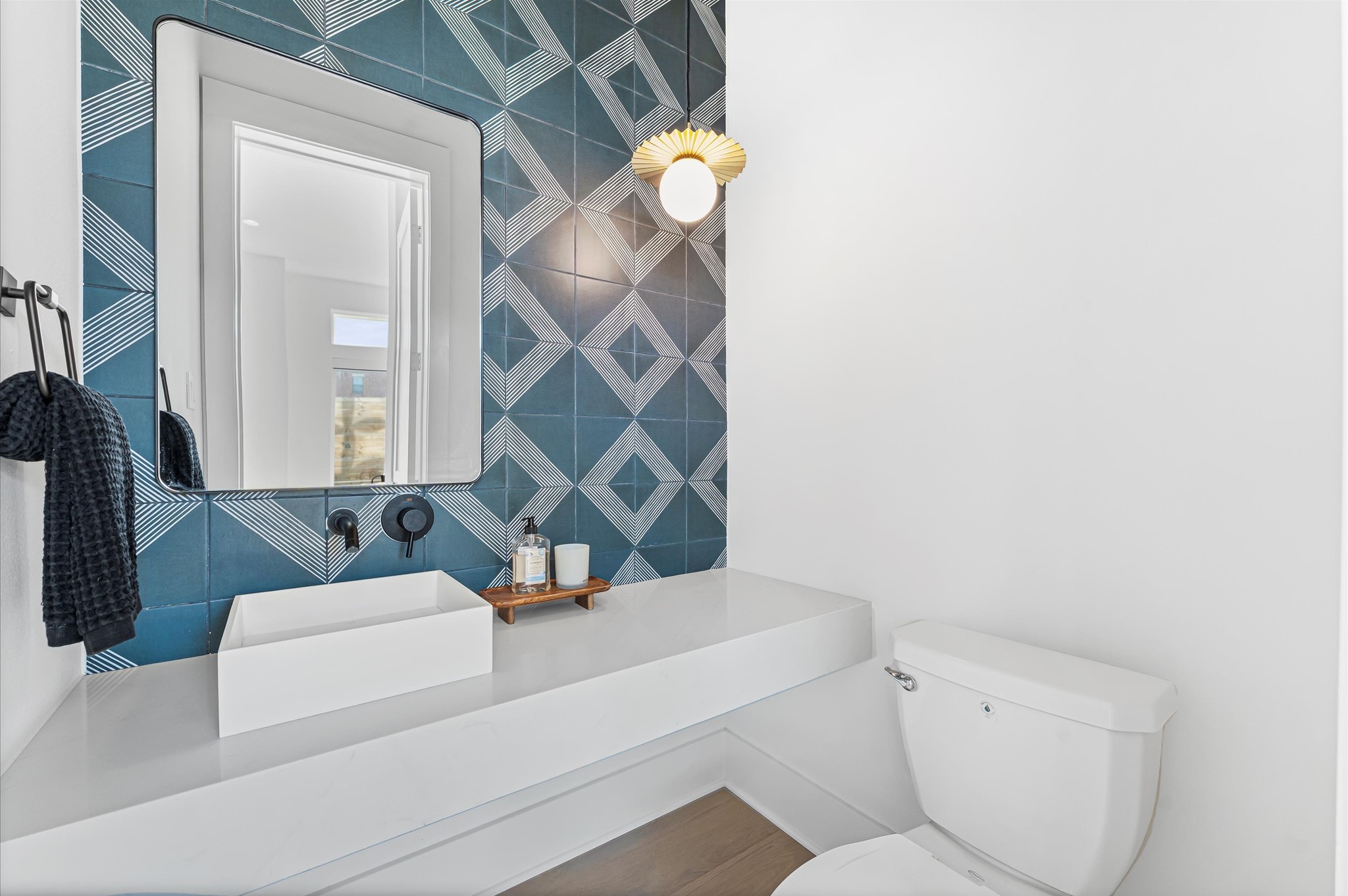 711 Lester Street Houston, TX 77007 - Photo 13 of 39 a bathroom with a sink and a mirror