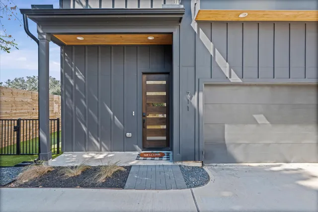 a side view of a house with garage