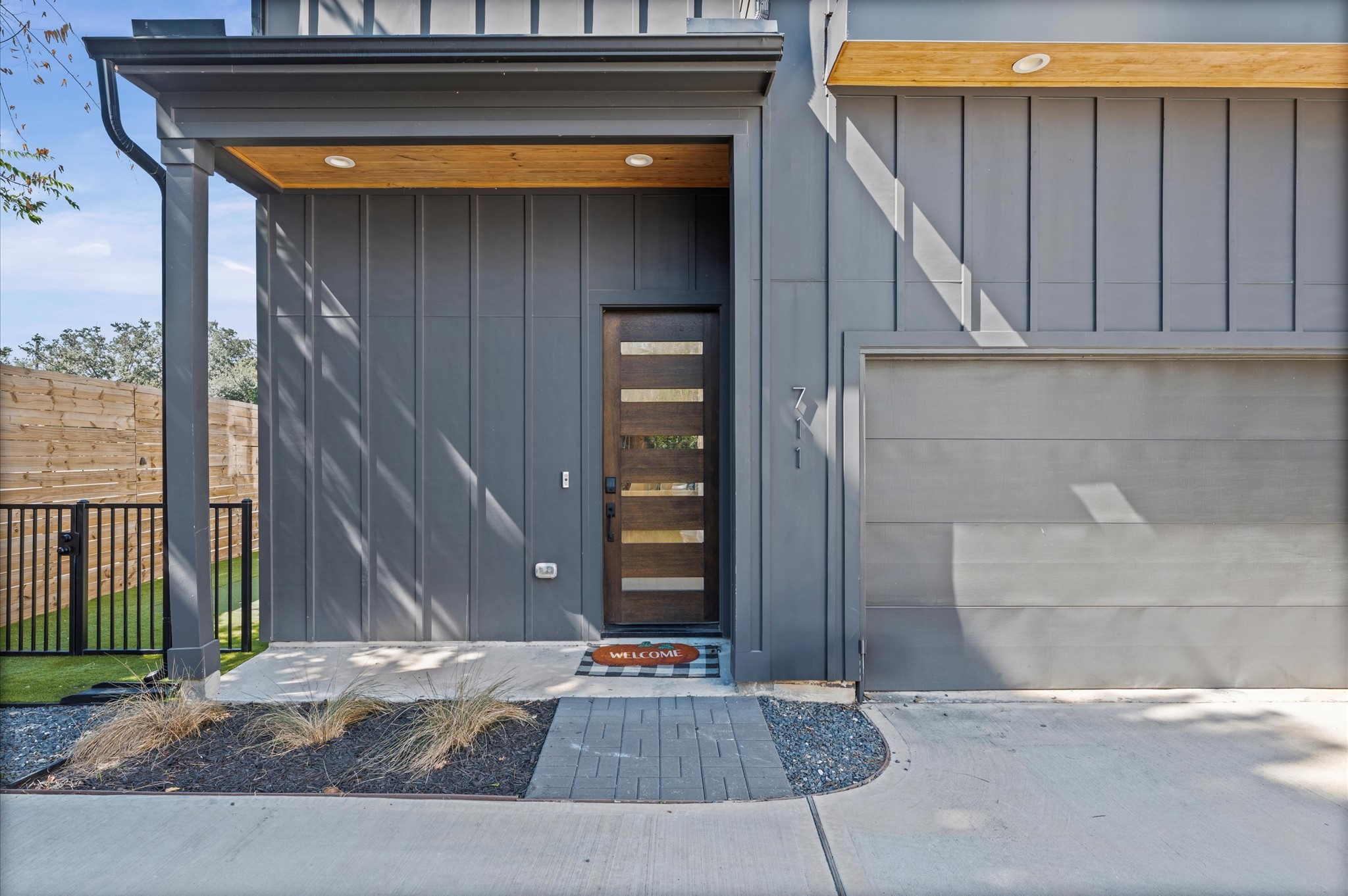 711 Lester Street Houston, TX 77007 - Photo 2 of 39 a side view of a house with garage