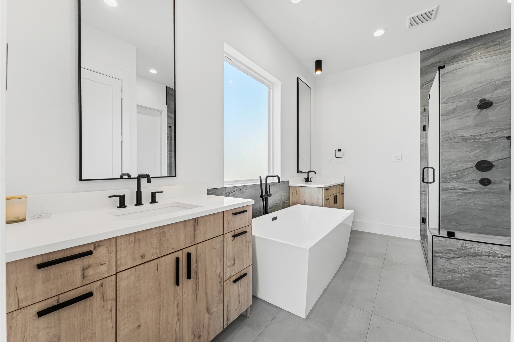 711 Lester Street Houston, TX 77007 - Photo 24 of 39 a view of bathroom with dual sinks