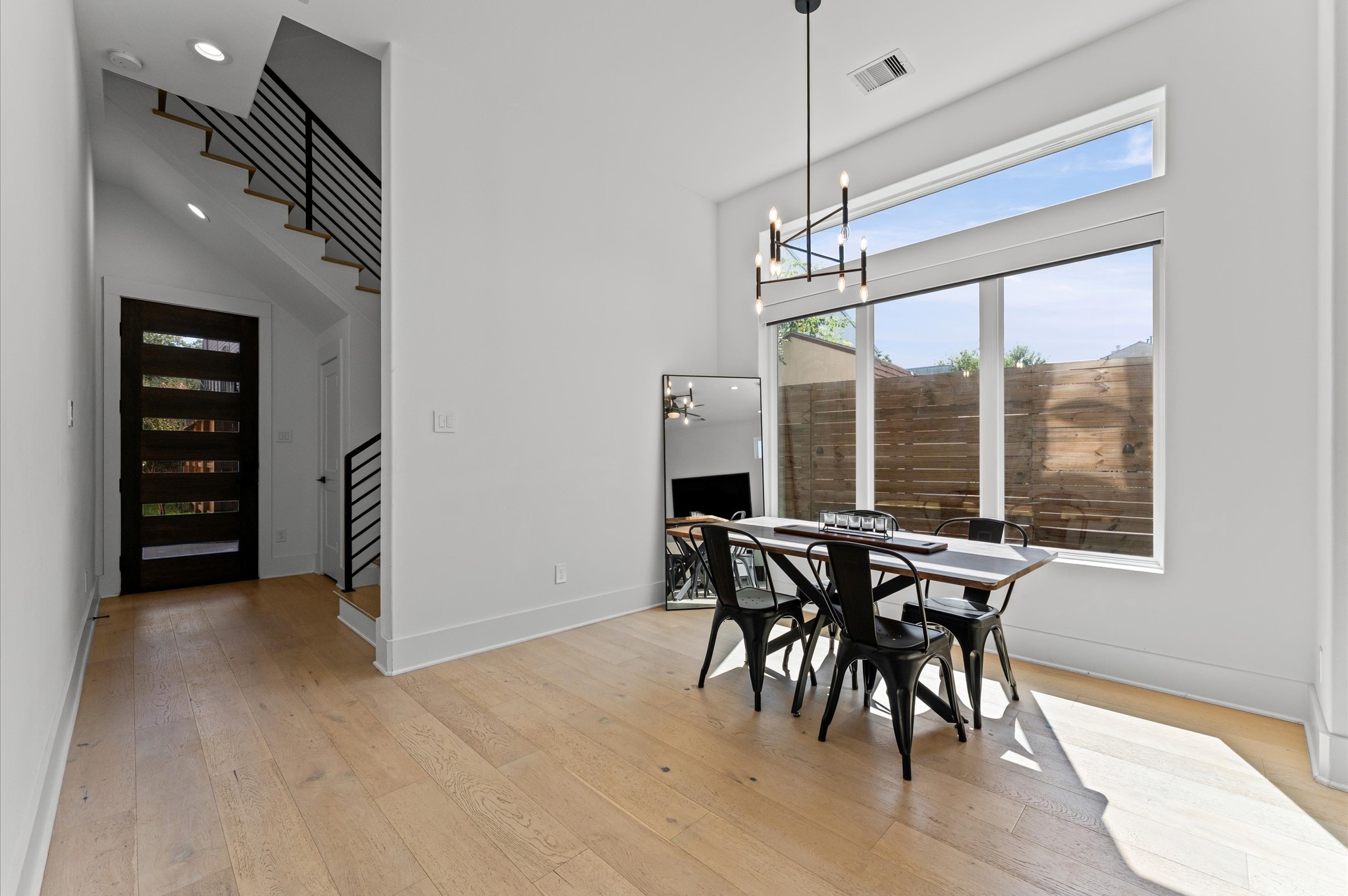 711 Lester Street Houston, TX 77007 - Photo 8 of 39 a view of a dining room with furniture window and outside view