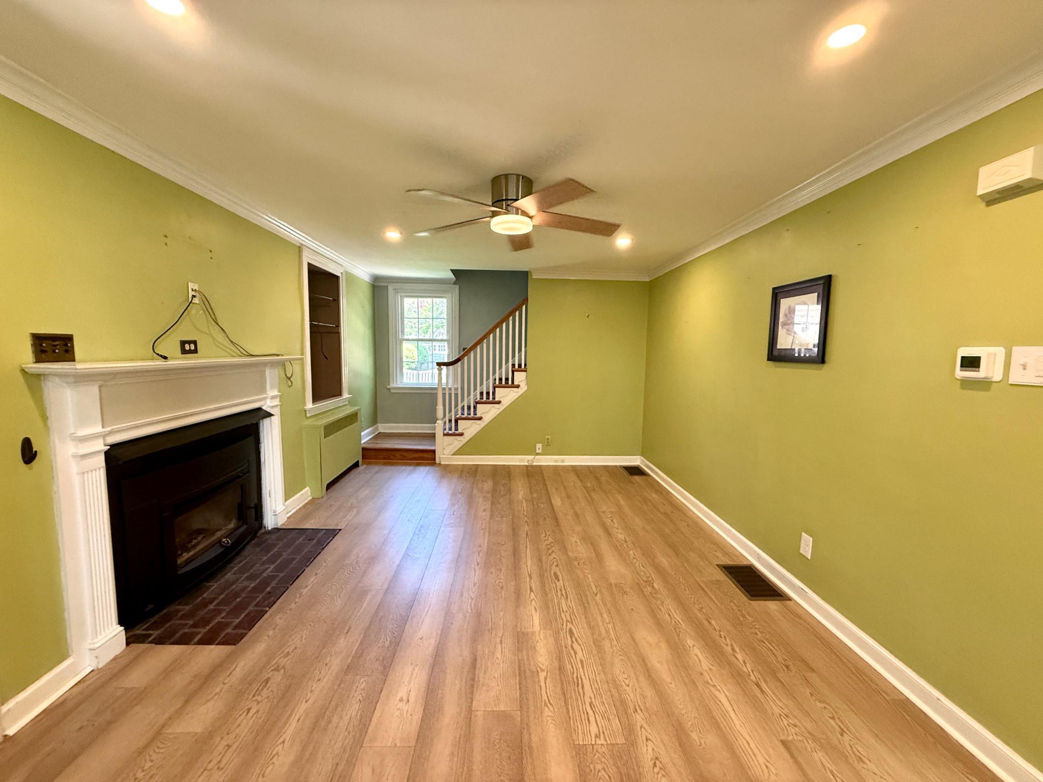 418 East Country Club Lane Wallingford, PA 19086 - Photo 10 of 59 Living room with wood burning fireplace insert