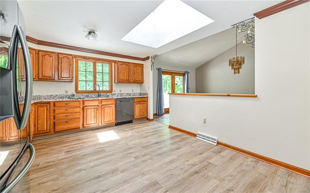 175 Dance Hall Road Apollo, PA 15613 - Photo 14 of 37 wooden floor in an empty room with a window and wooden floor