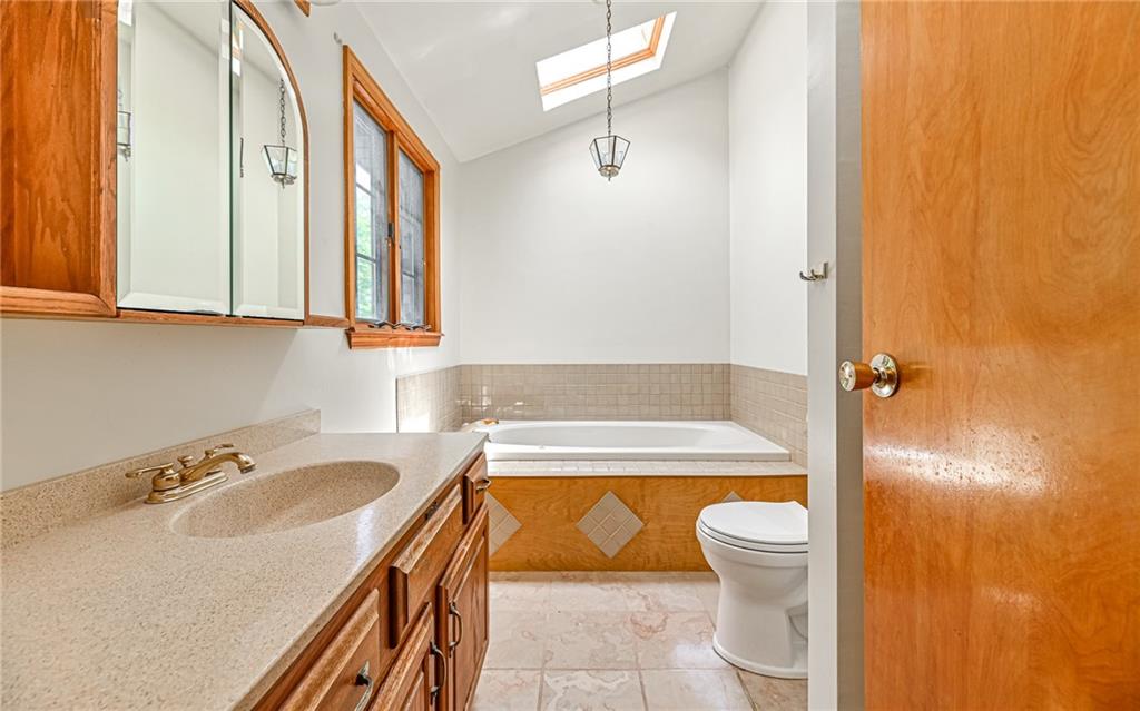 175 Dance Hall Road Apollo, PA 15613 - Photo 18 of 37 a bathroom with a sink a toilet and bathtub