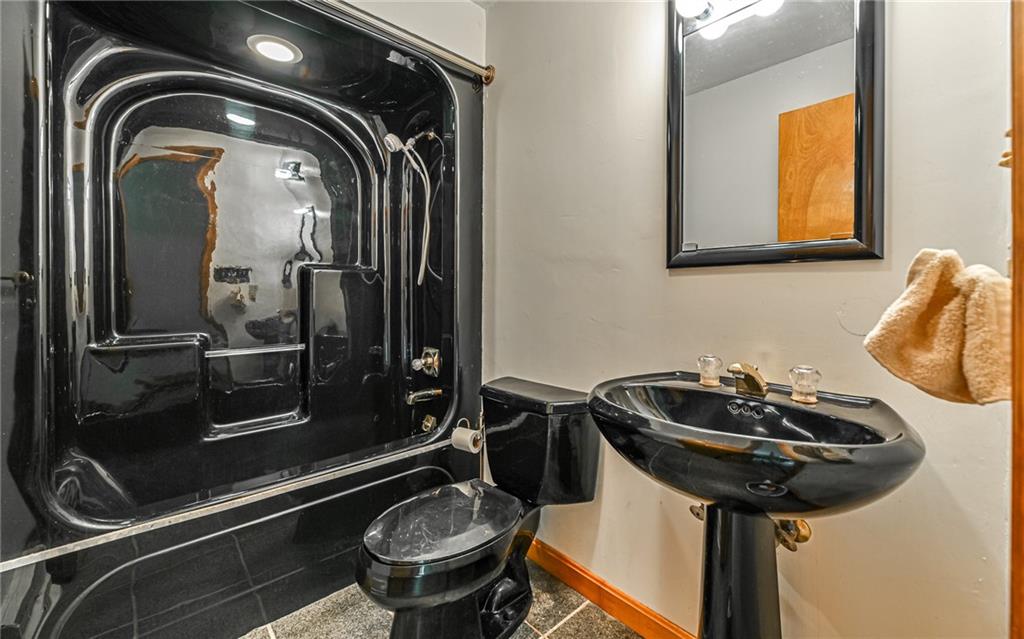 175 Dance Hall Road Apollo, PA 15613 - Photo 21 of 37 a bathroom with a sink and a mirror