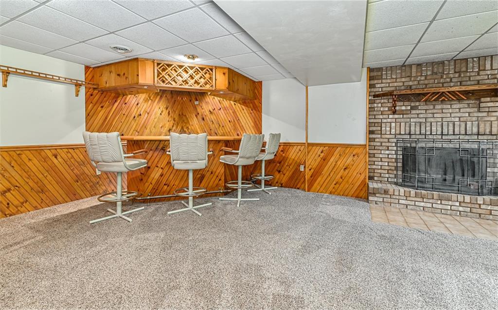 175 Dance Hall Road Apollo, PA 15613 - Photo 24 of 37 a view of an empty room with a fireplace and a window