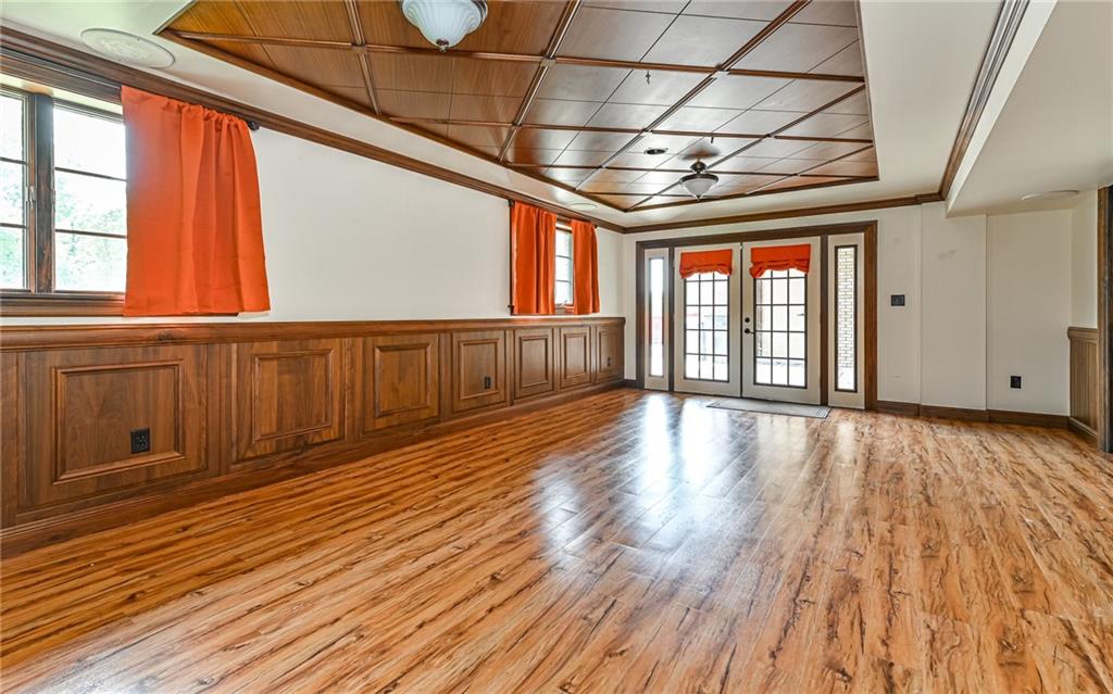 175 Dance Hall Road Apollo, PA 15613 - Photo 29 of 37 a view of an empty room with wooden floor and windows