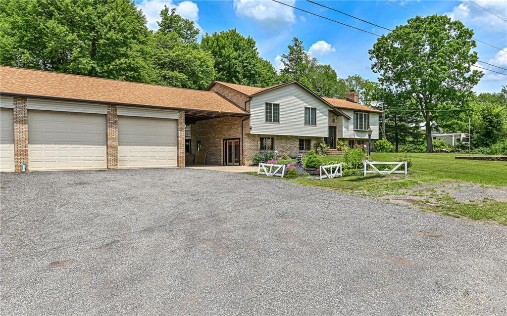 175 Dance Hall Road Apollo, PA 15613 - Photo 3 of 37 a front view of a house with garden
