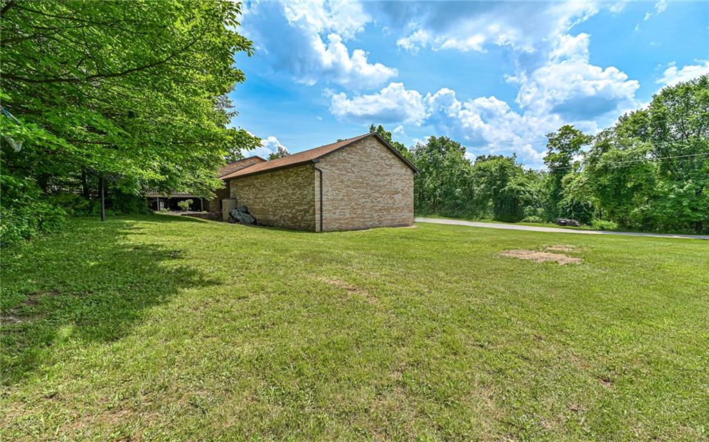 175 Dance Hall Road Apollo, PA 15613 - Photo 6 of 37 a view of a yard with a house in the background