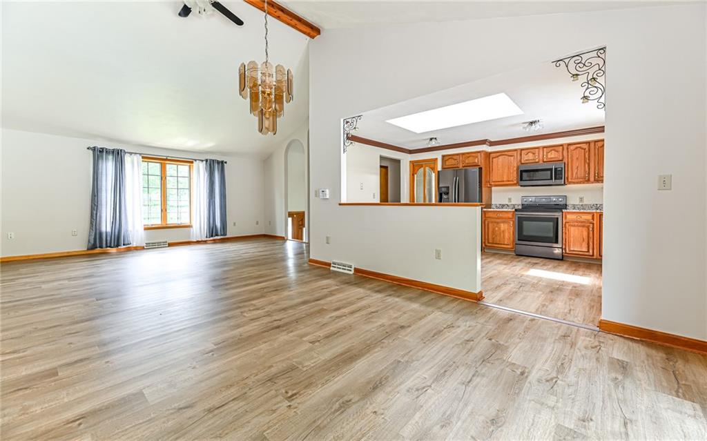 175 Dance Hall Road Apollo, PA 15613 - Photo 10 of 37 an empty room with wooden floor and windows
