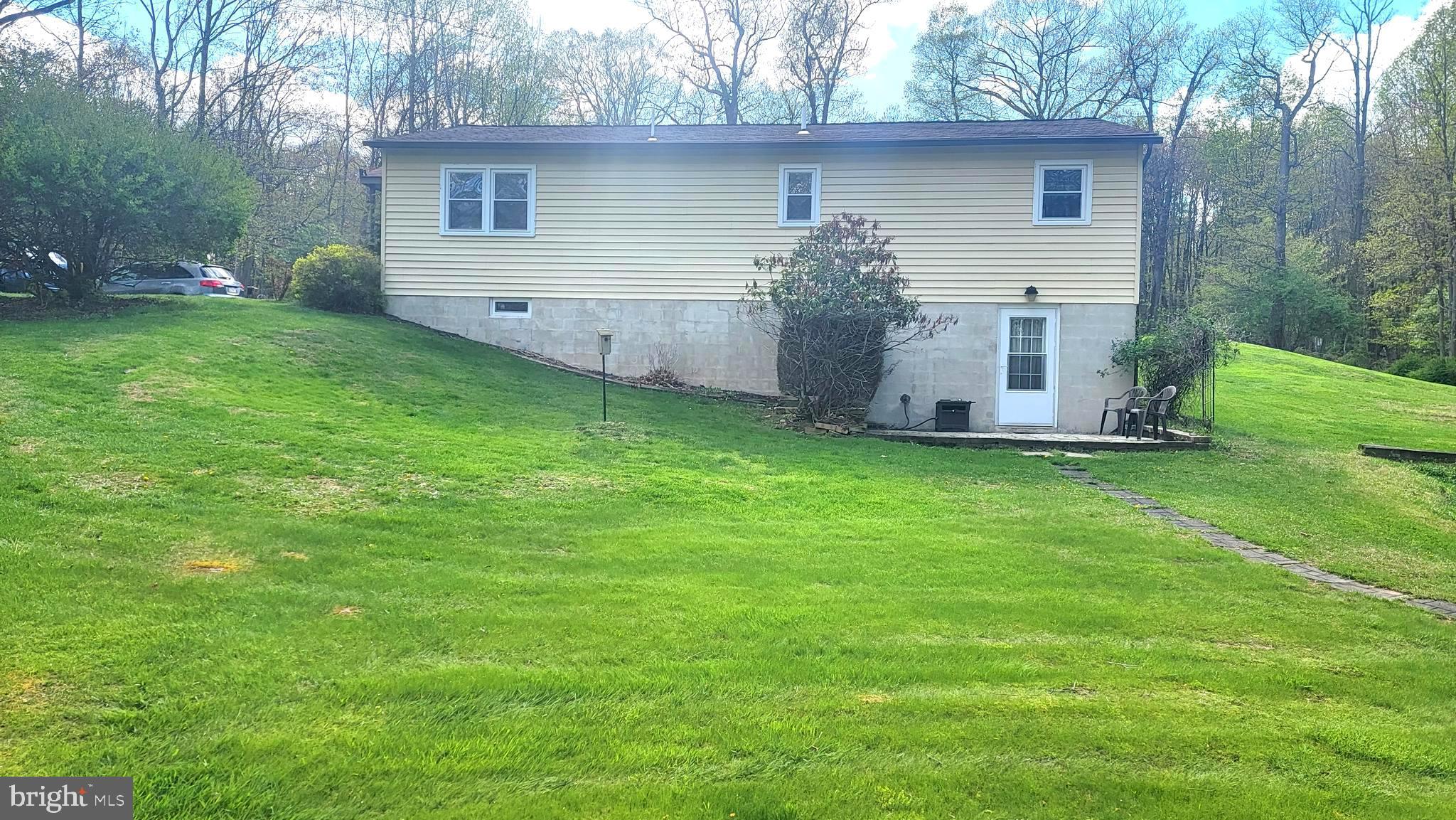 1313 Chestnut Hill Road Morgantown, PA 19543 - Photo 25 of 33 BACK ( WALK OUT FROM FAMILY ROOM)