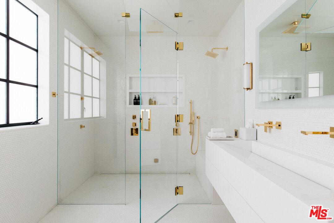 1346 Abbot Kinney Boulevard Venice, CA 90291 - Photo 14 of 18 a bathroom with a bathtub and a shower