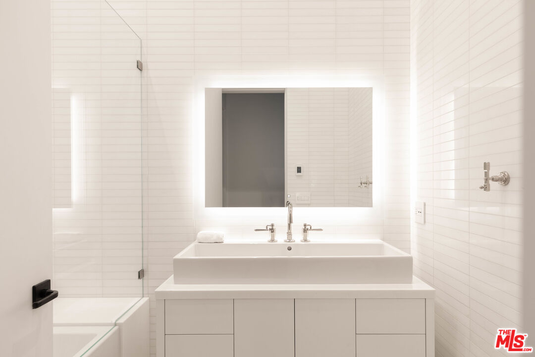 1346 Abbot Kinney Boulevard Venice, CA 90291 - Photo 16 of 18 a bathroom with a sink and a mirror