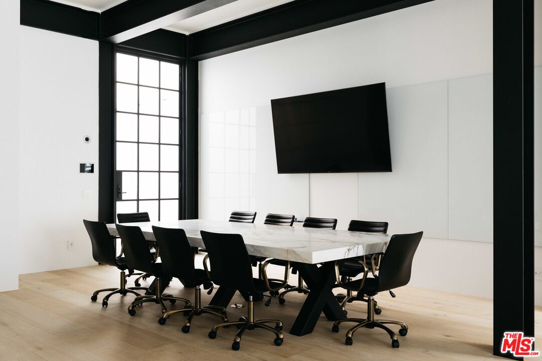 1346 Abbot Kinney Boulevard Venice, CA 90291 - Photo 3 of 18 a view of a dining room with a table and chairs