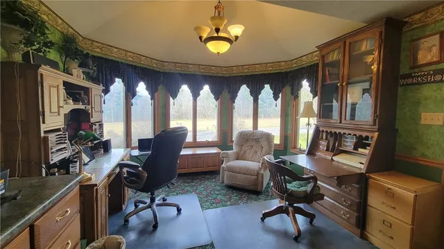 a bathroom with a toilet a sink and a large mirror
