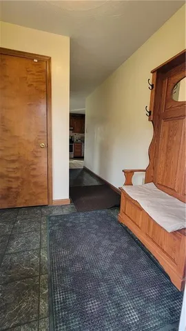 a view of a room with an entryway