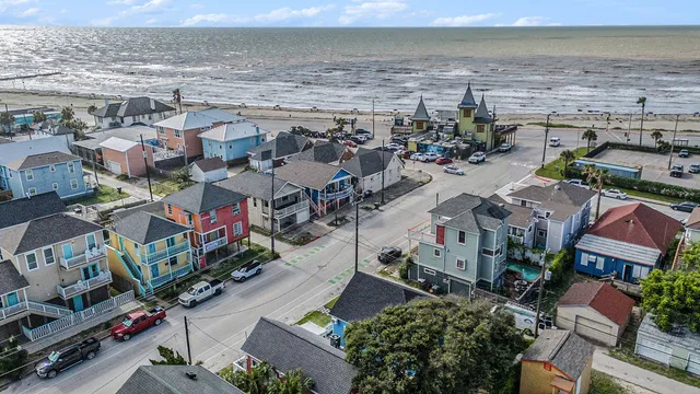 an aerial view of beach and ocean