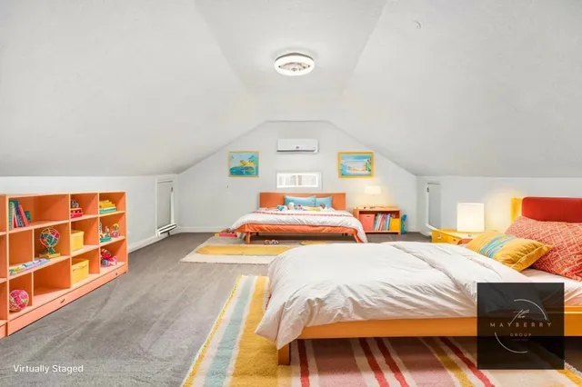 a view of a chair and table in backyard of the house