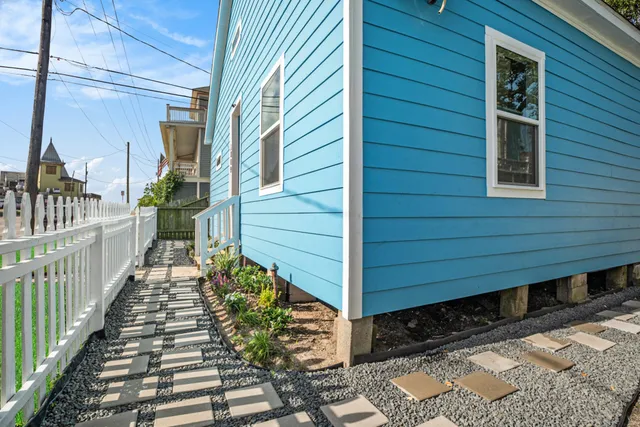 an aerial view of residential house with outdoor space