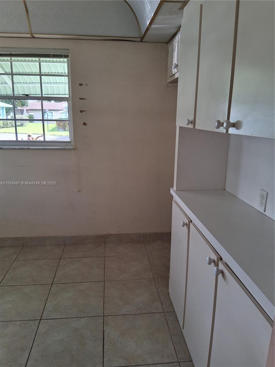 635 Hummingbird Lane Delray Beach, FL 33445 - Photo 7 of 21 a view of a kitchen