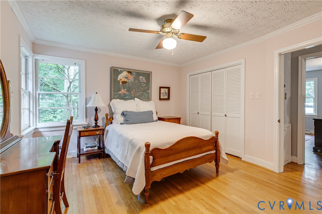 4411 Arrowhead Road Richmond, VA 23235 - Photo 23 of 33 a bedroom with a bed and a large window