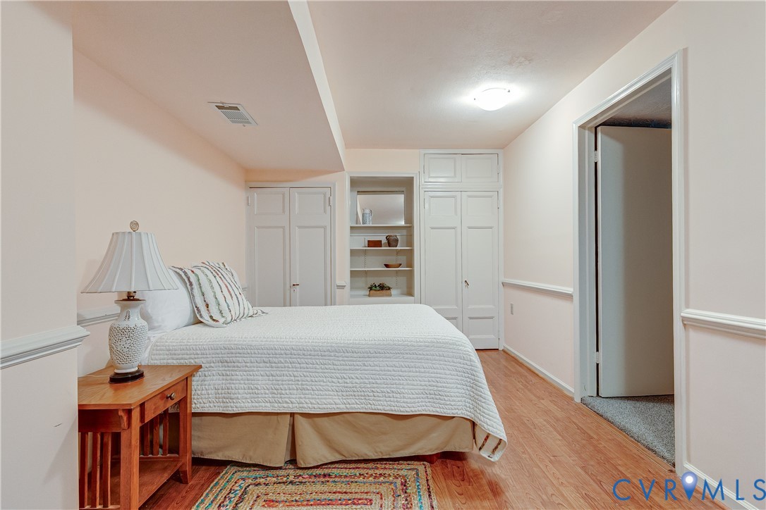 4411 Arrowhead Road Richmond, VA 23235 - Photo 25 of 33 a bedroom with a bed and a view of kitchen