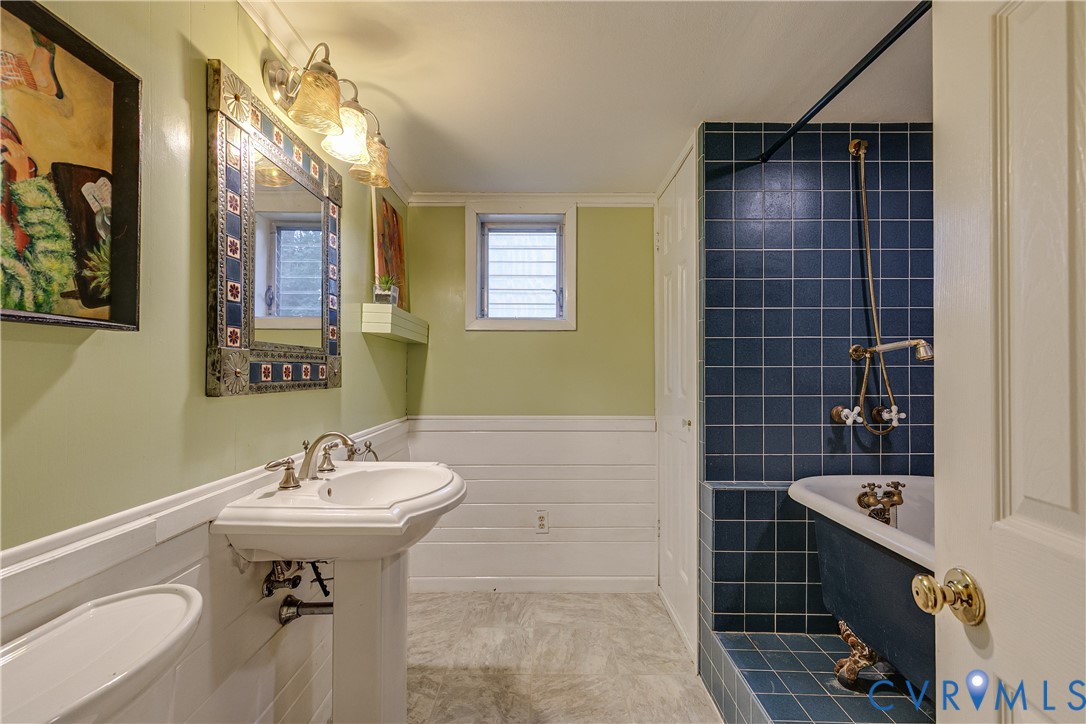 4411 Arrowhead Road Richmond, VA 23235 - Photo 27 of 33 a bathroom with a sink toilet and shower