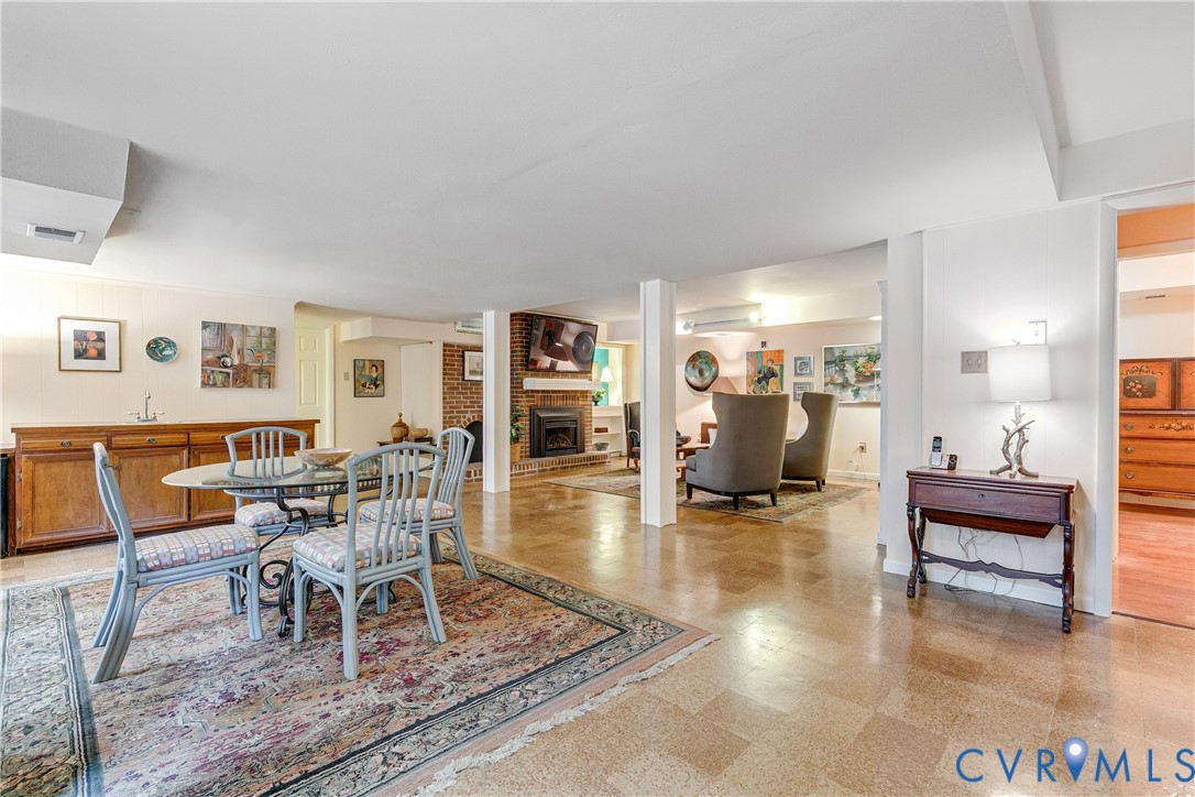 4411 Arrowhead Road Richmond, VA 23235 - Photo 29 of 33 a living room with furniture and wooden floor