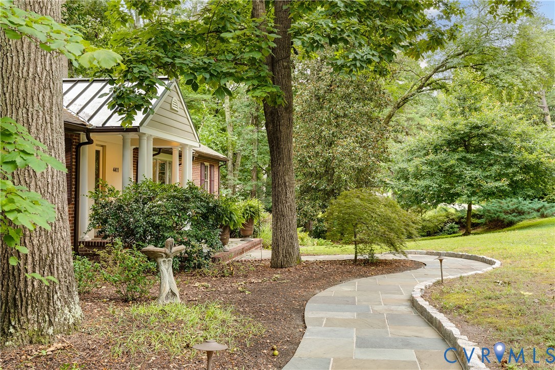 4411 Arrowhead Road Richmond, VA 23235 - Photo 3 of 33 a view of a house with backyard and trees
