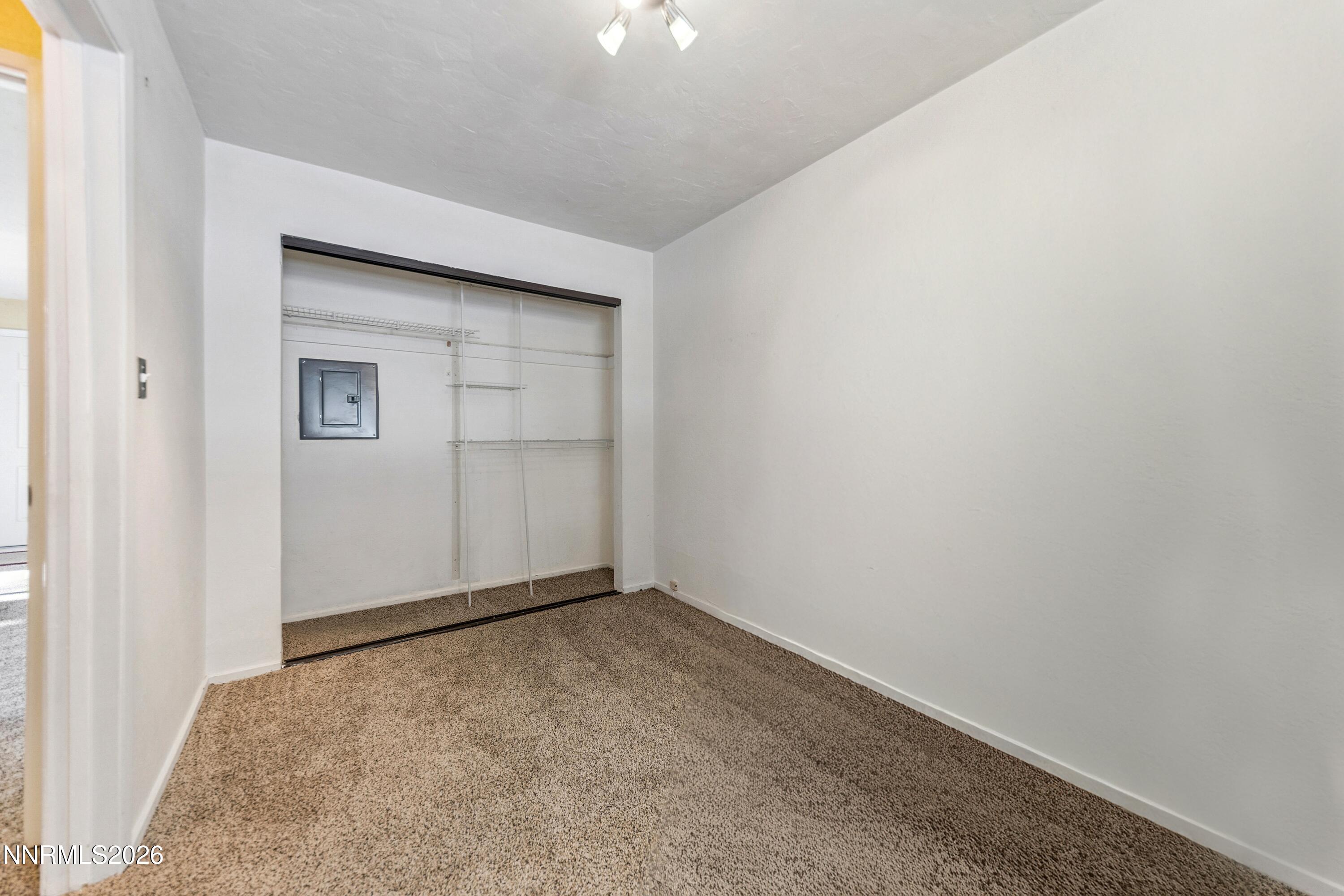 219 South Benjamin Drive, Unit B Stateline, NV 89449 - Photo 11 of 22 an empty room with closet