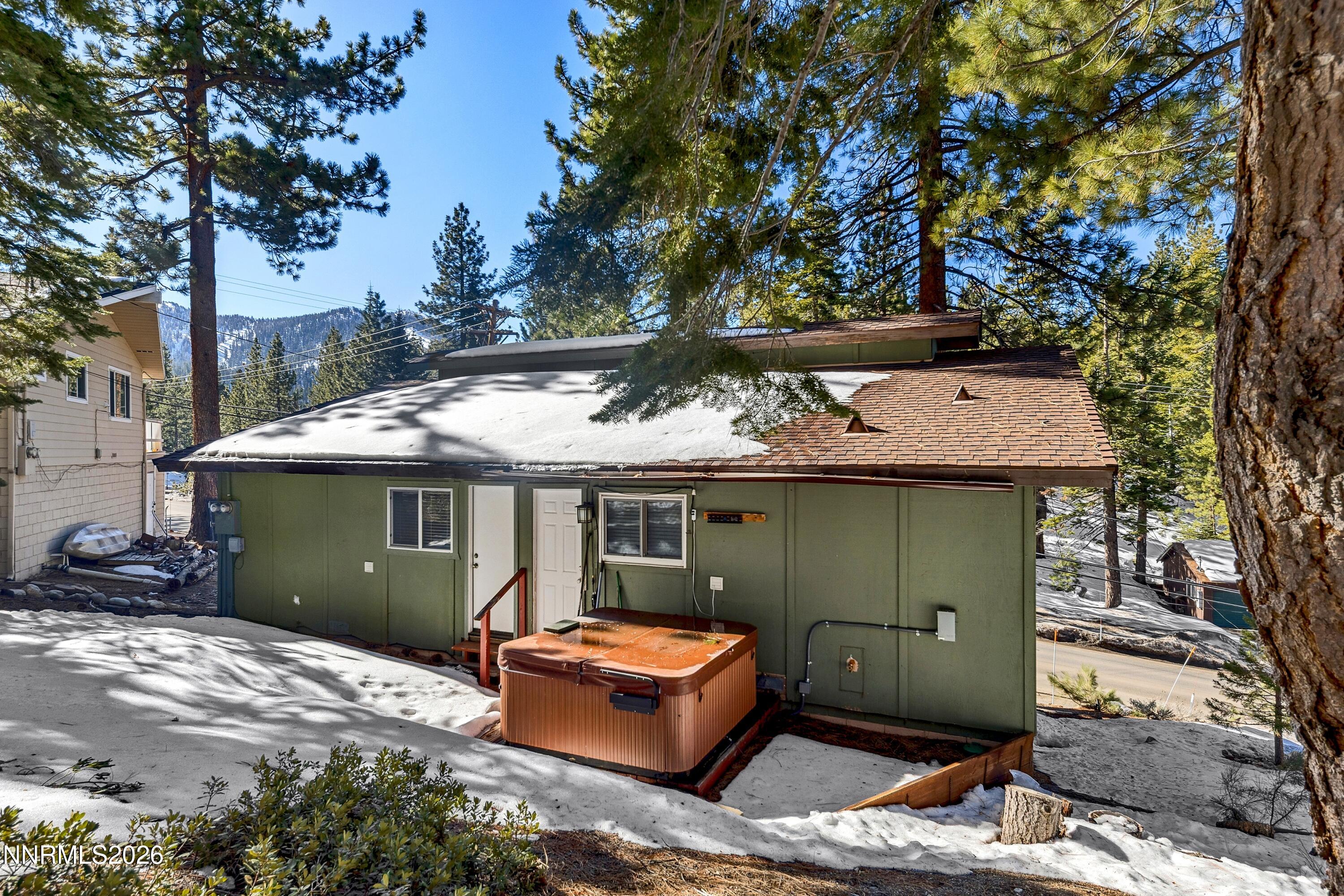 219 South Benjamin Drive, Unit B Stateline, NV 89449 - Photo 17 of 22 a backyard of a house with outdoor seating