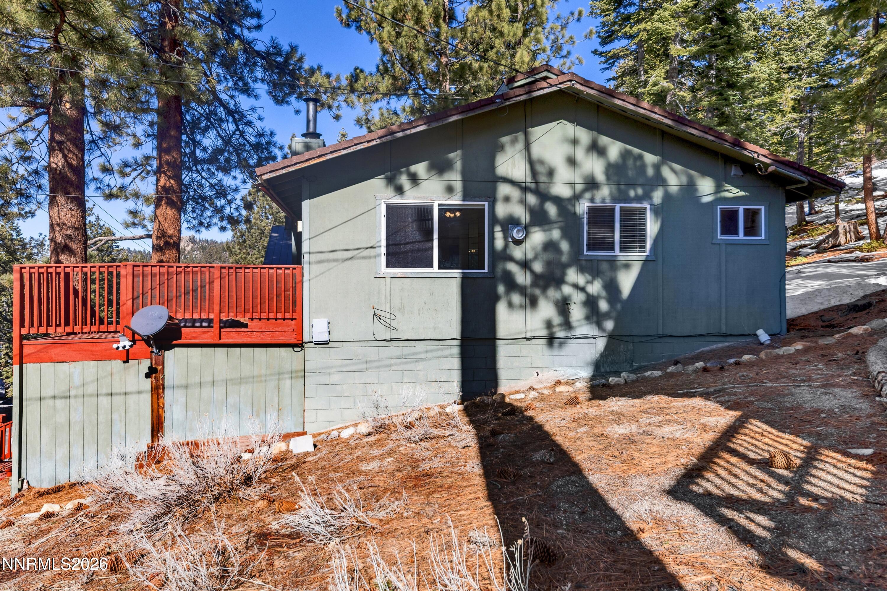 219 South Benjamin Drive, Unit B Stateline, NV 89449 - Photo 18 of 22 a front view of a house with garden
