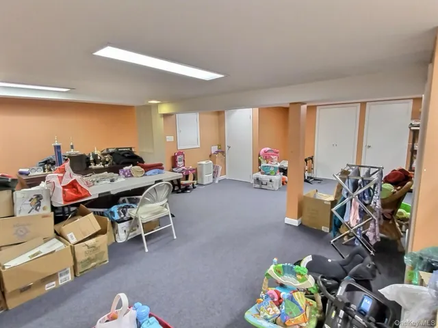 a living room filled with furniture and a couch