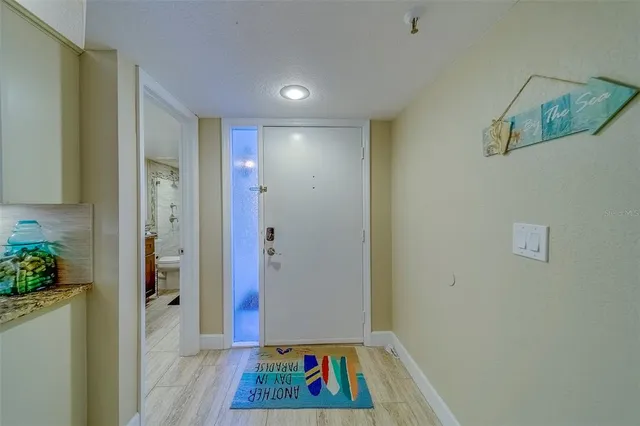 a view of a dining area with furniture and wooden floor