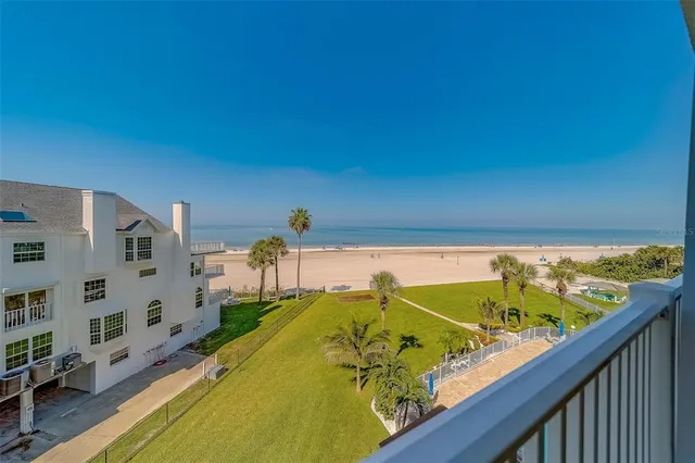 a view of a balcony with an ocean
