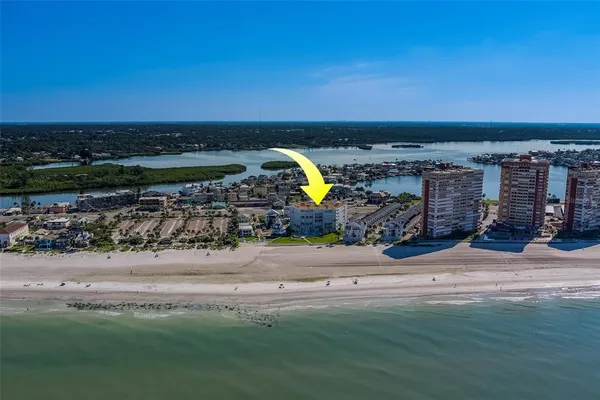 a front view of a building with outdoor space