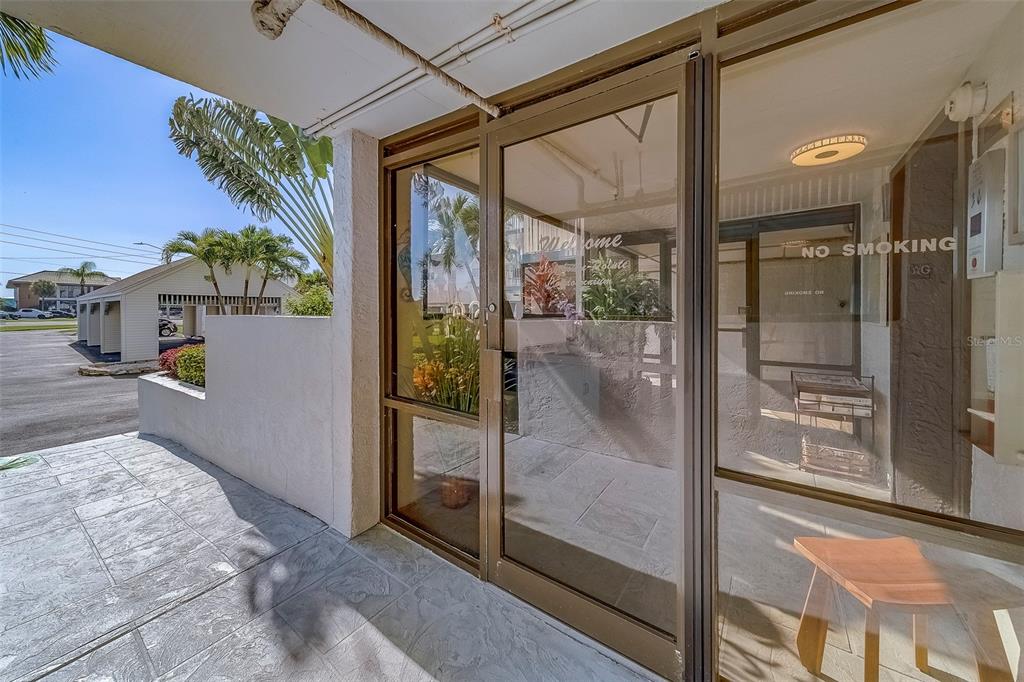 17980 Gulf Boulevard, Unit 402 Redington Shores, FL 33708 - Photo 56 of 63 a view of a glass door and a living room