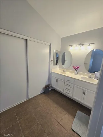 a bathroom with a tub and a shower
