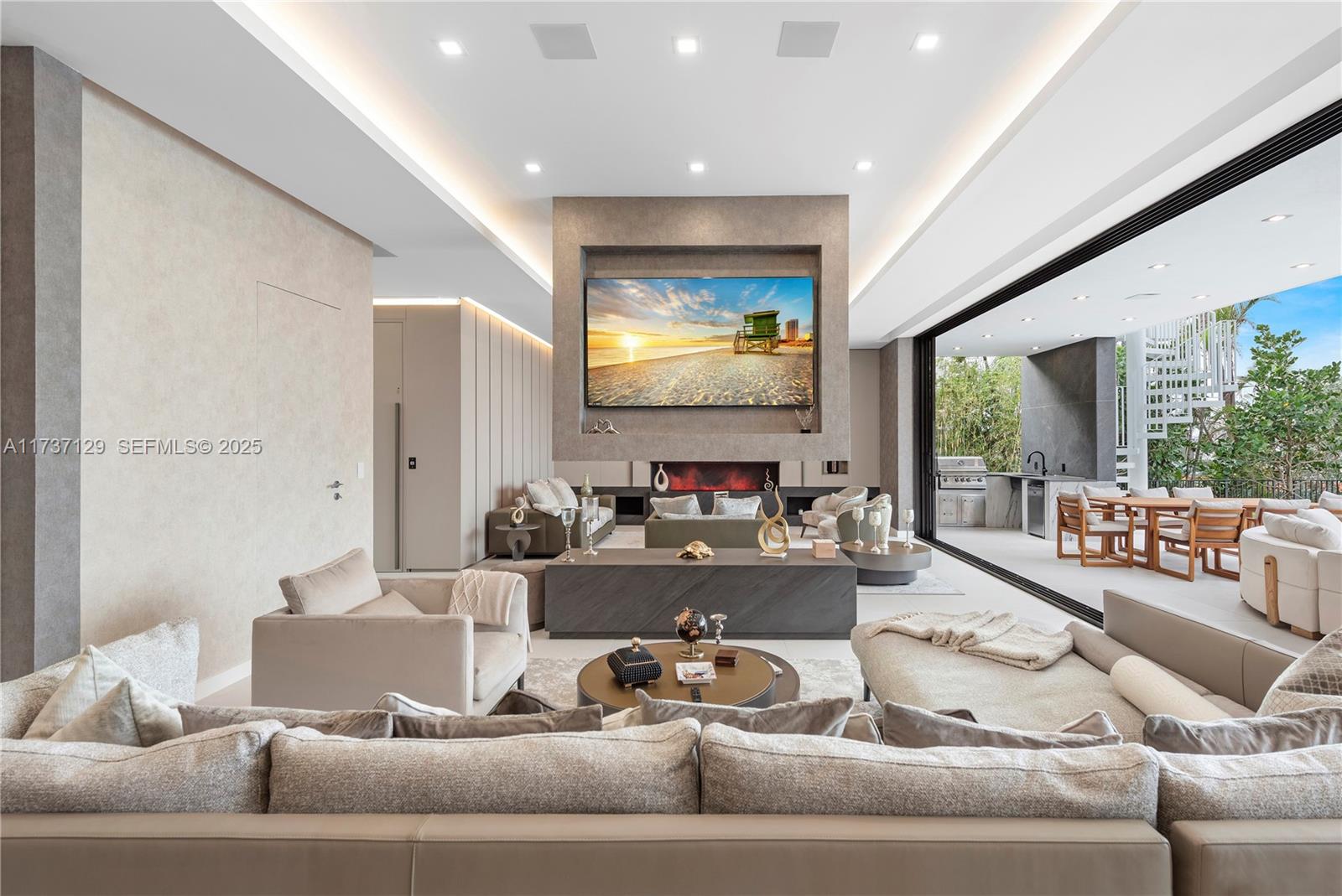 1785 Cleveland Road Miami Beach, FL 33141 - Photo 12 of 67 a living room with furniture and a large window