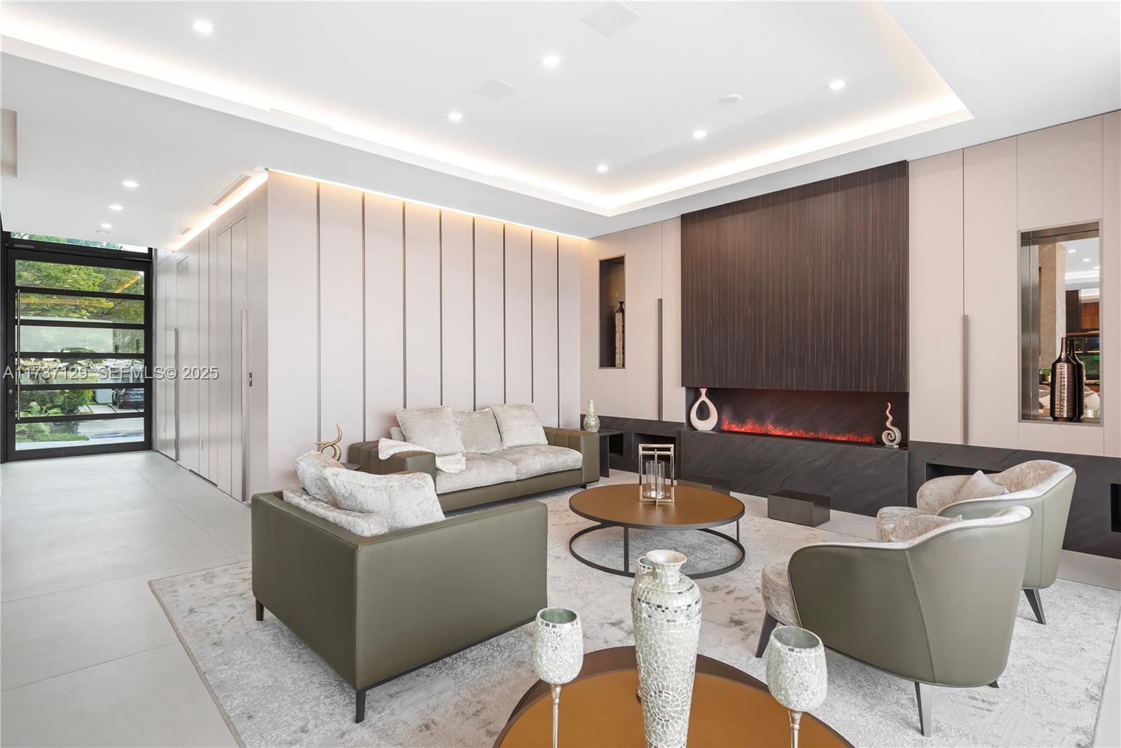 1785 Cleveland Road Miami Beach, FL 33141 - Photo 14 of 67 a living room with furniture and a large window