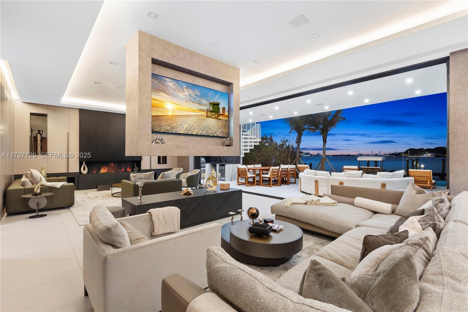 1785 Cleveland Road Miami Beach, FL 33141 - Photo 16 of 67 a living room with furniture and a painting