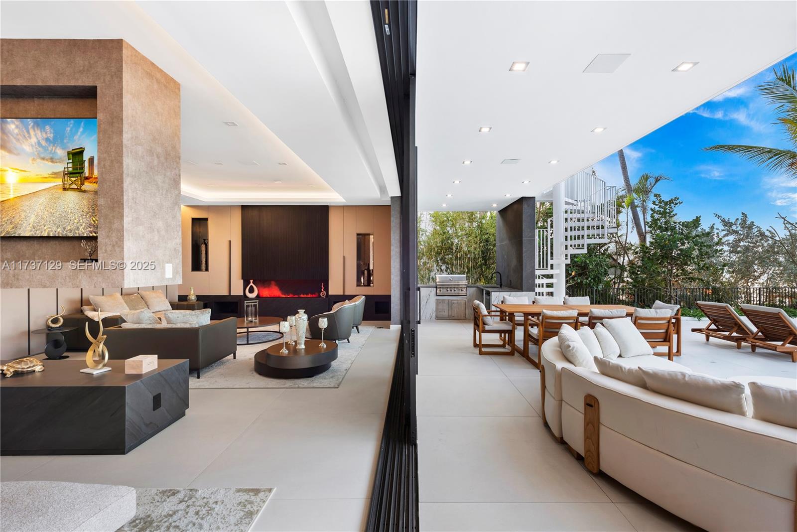 1785 Cleveland Road Miami Beach, FL 33141 - Photo 17 of 67 a kitchen with counter top space and living room furniture