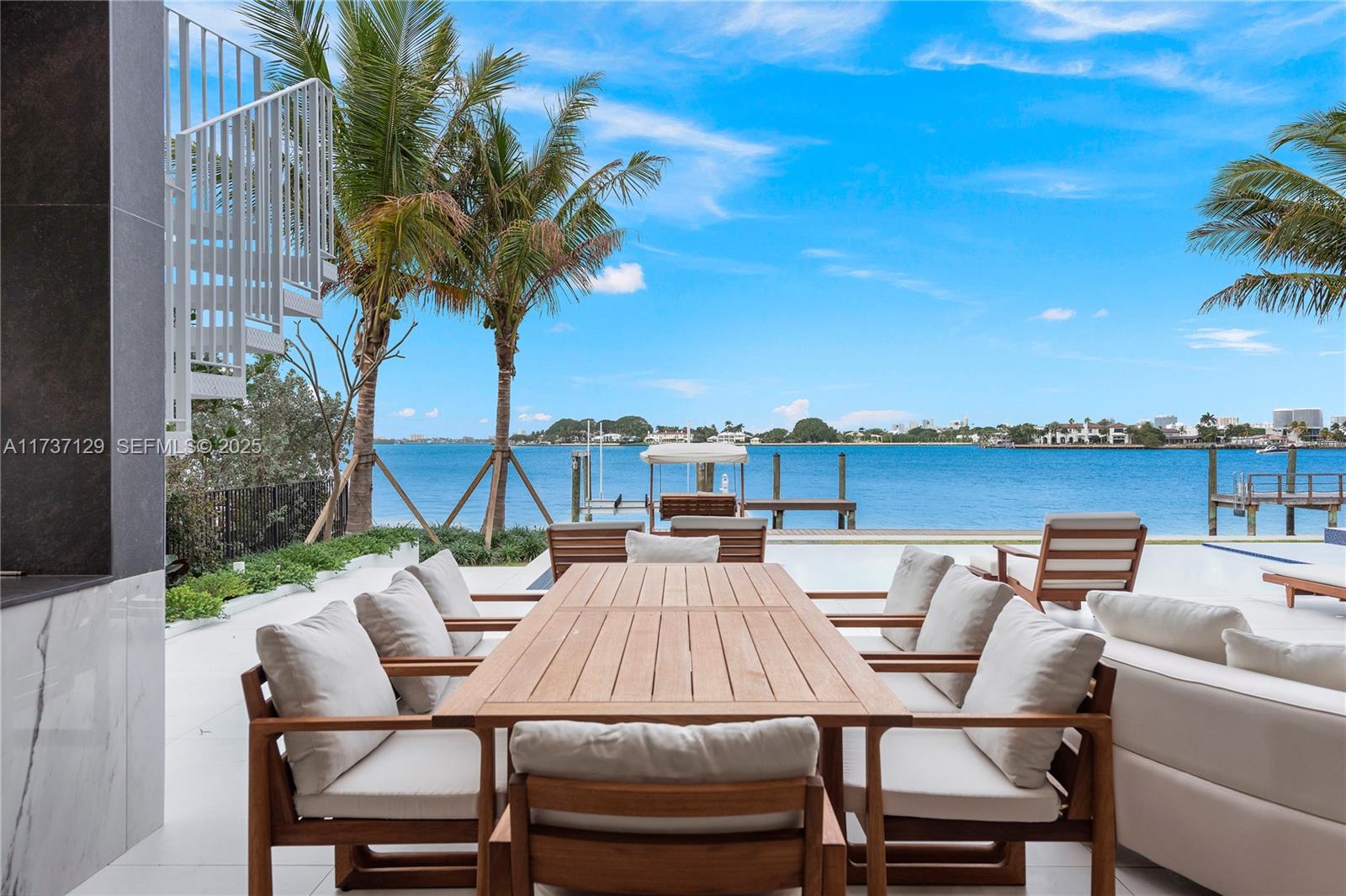 1785 Cleveland Road Miami Beach, FL 33141 - Photo 36 of 67 a view of a patio with table and chairs