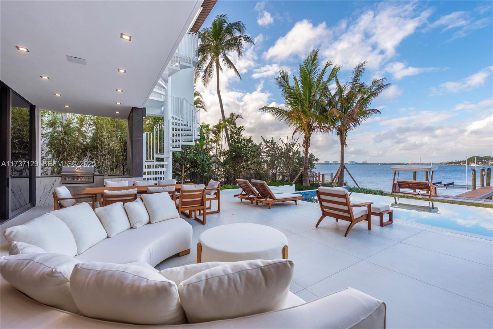 1785 Cleveland Road Miami Beach, FL 33141 - Photo 38 of 67 a outdoor living space with patio furniture and a potted plant