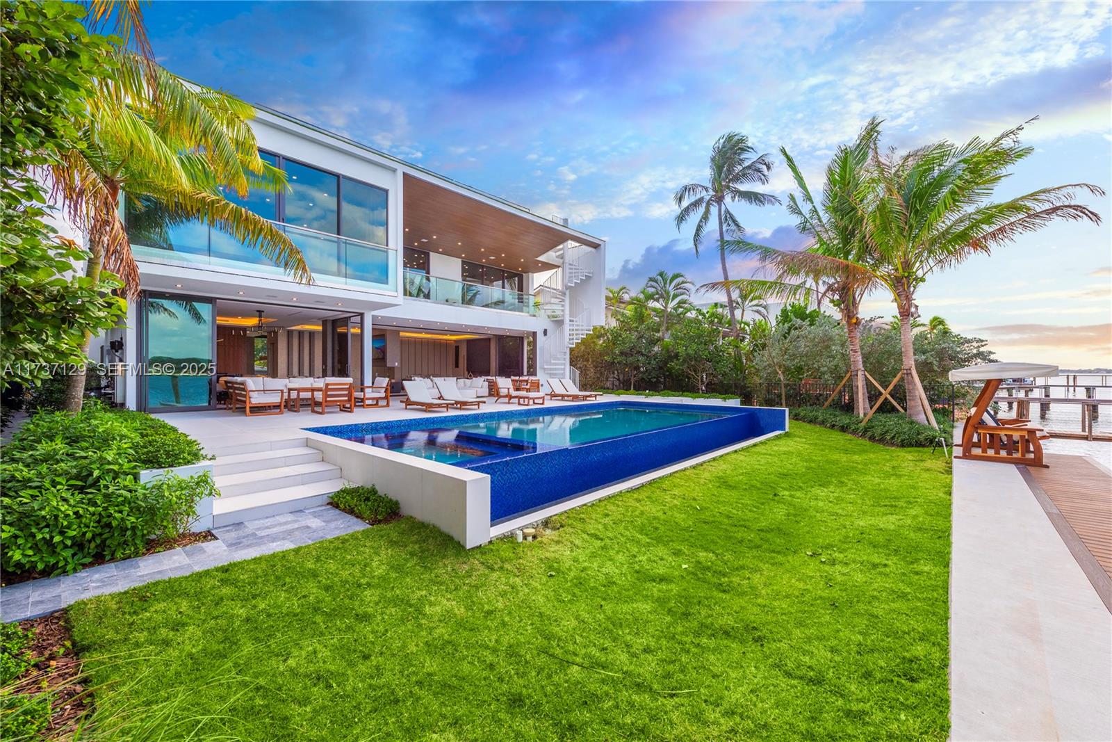 1785 Cleveland Road Miami Beach, FL 33141 - Photo 42 of 67 a swimming pool with outdoor seating and yard