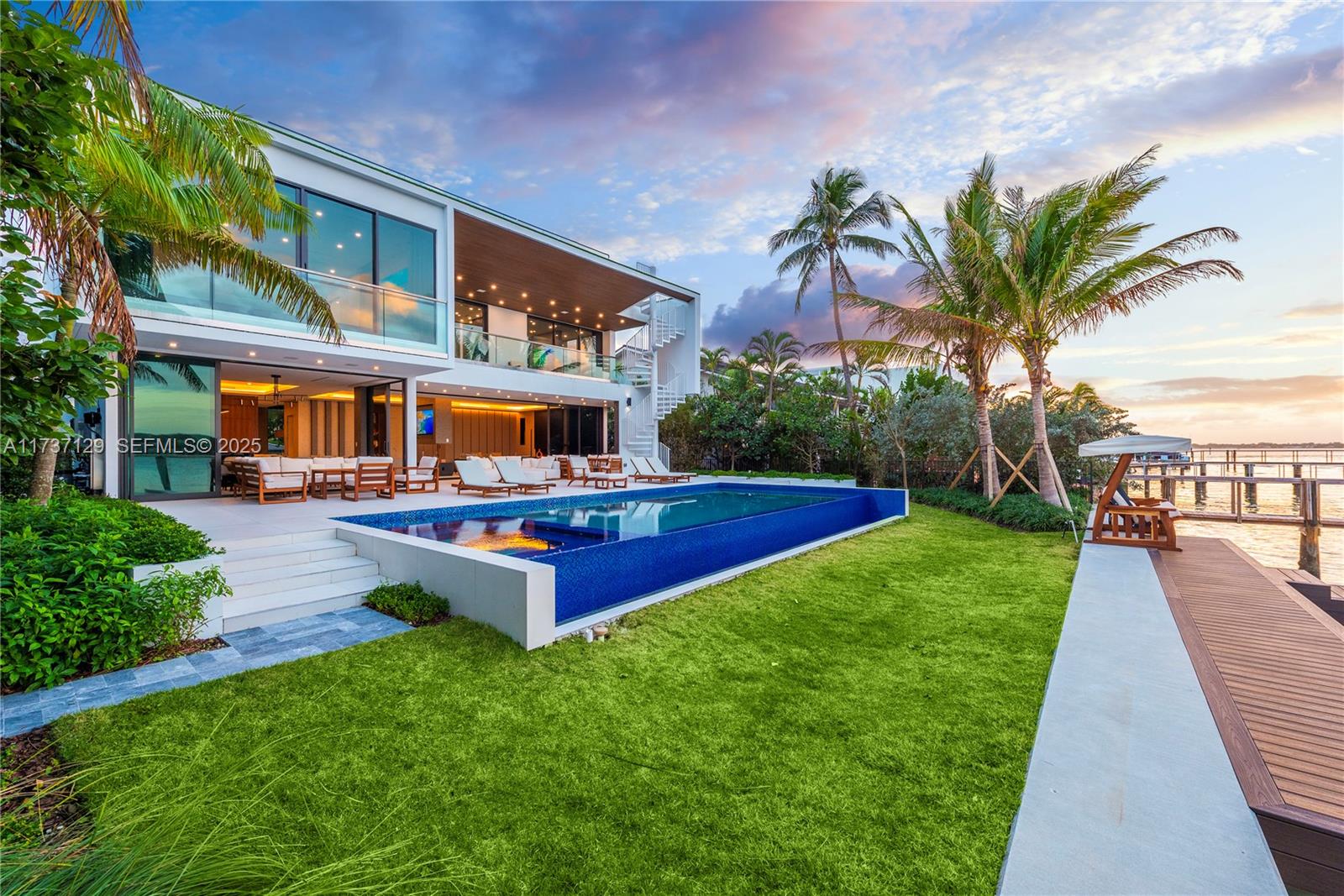1785 Cleveland Road Miami Beach, FL 33141 - Photo 45 of 67 a front view of house with yard and outdoor seating