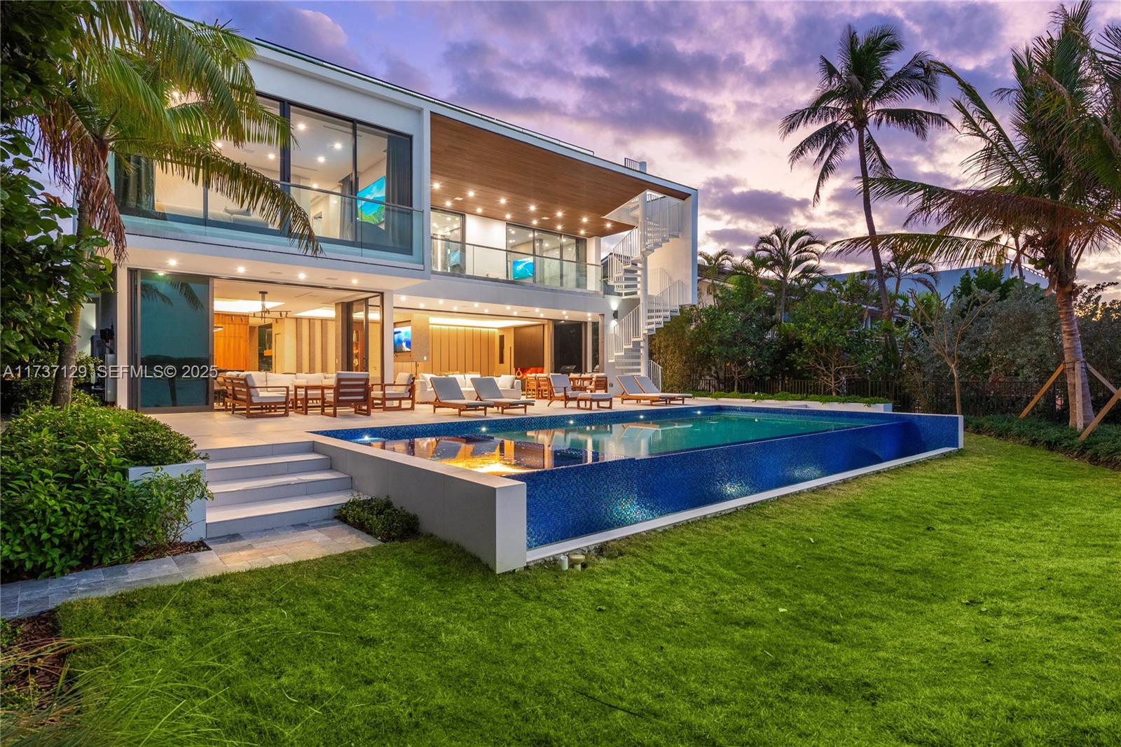 1785 Cleveland Road Miami Beach, FL 33141 - Photo 55 of 67 a view of a house with a yard patio and swimming pool