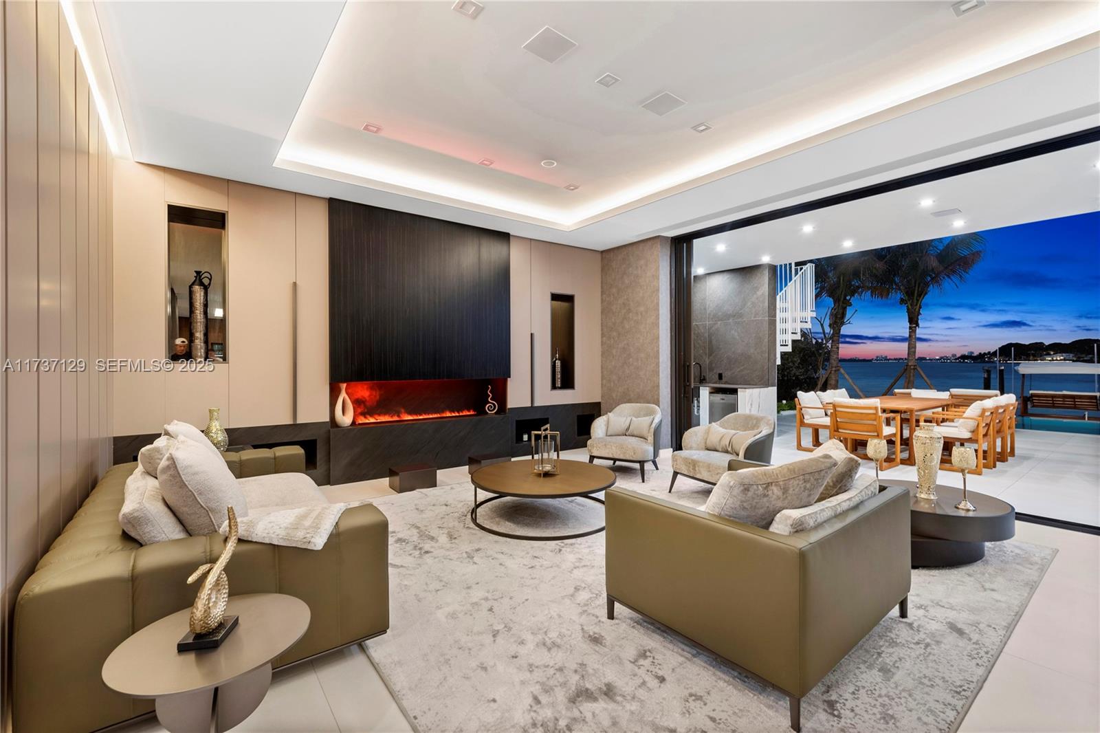 1785 Cleveland Road Miami Beach, FL 33141 - Photo 7 of 67 a living room with furniture kitchen view and a large window