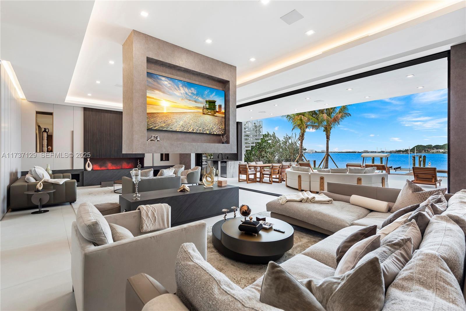 1785 Cleveland Road Miami Beach, FL 33141 - Photo 8 of 67 a living room with furniture and a large window